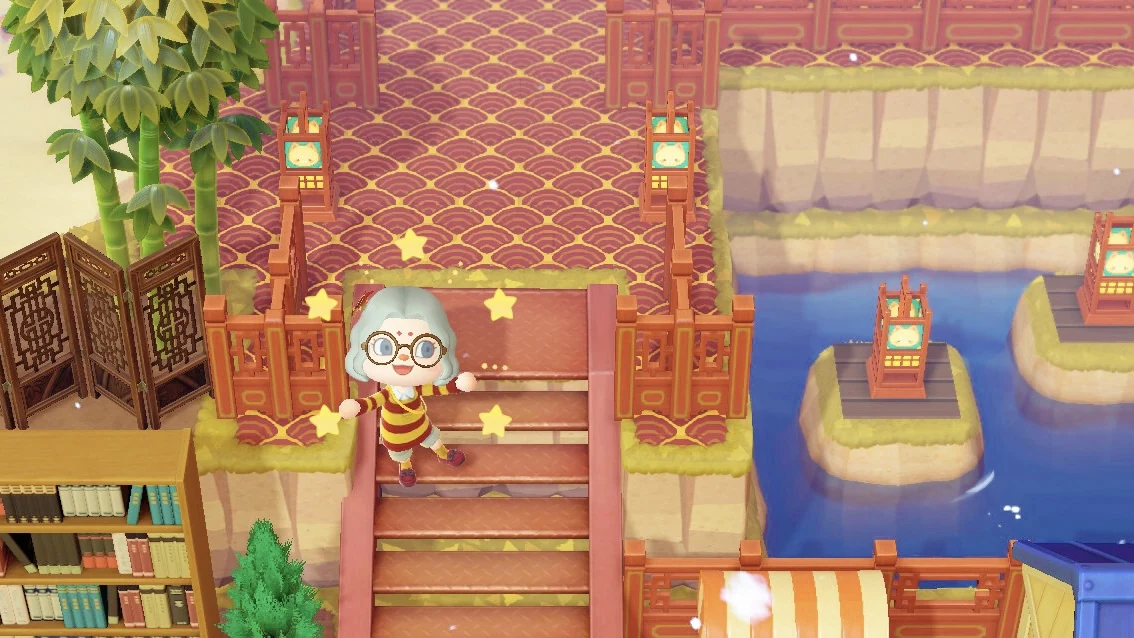 Animal Crossing waterside build with repeating red and gold scallop flooring